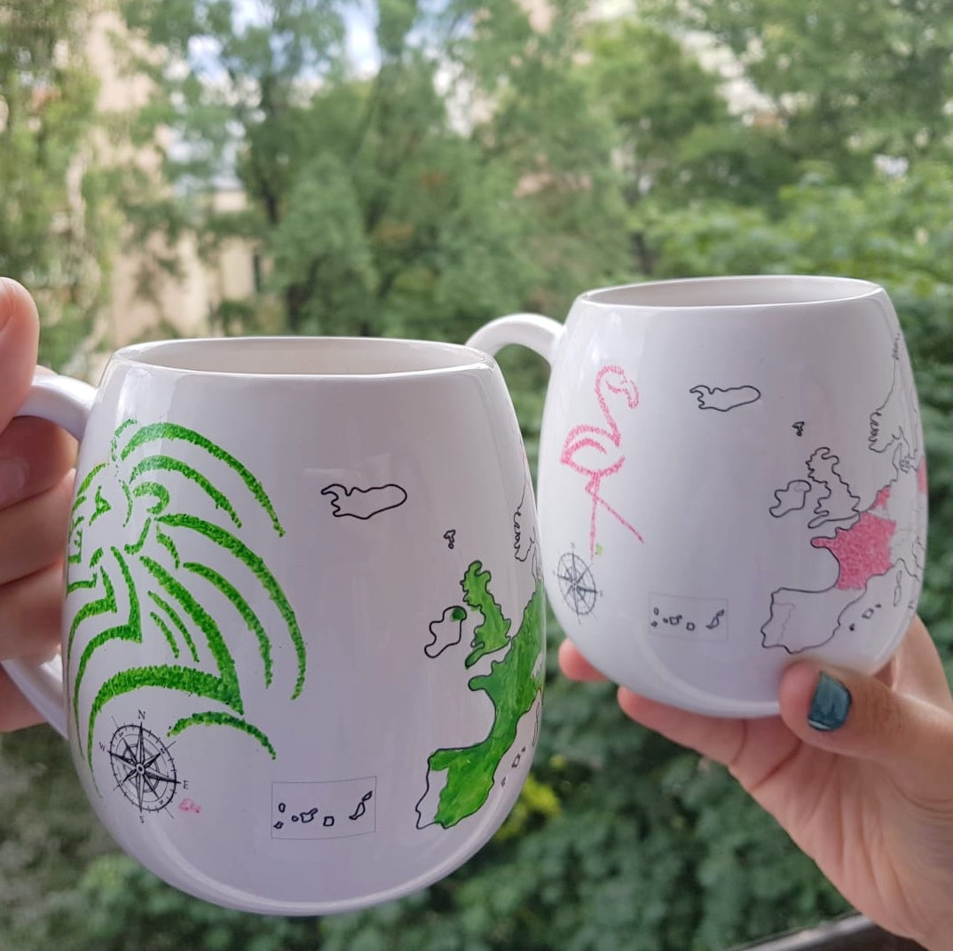 Two coloured Europe mugs in green and pink with an artsy sketch on them, gift idea for travel couples