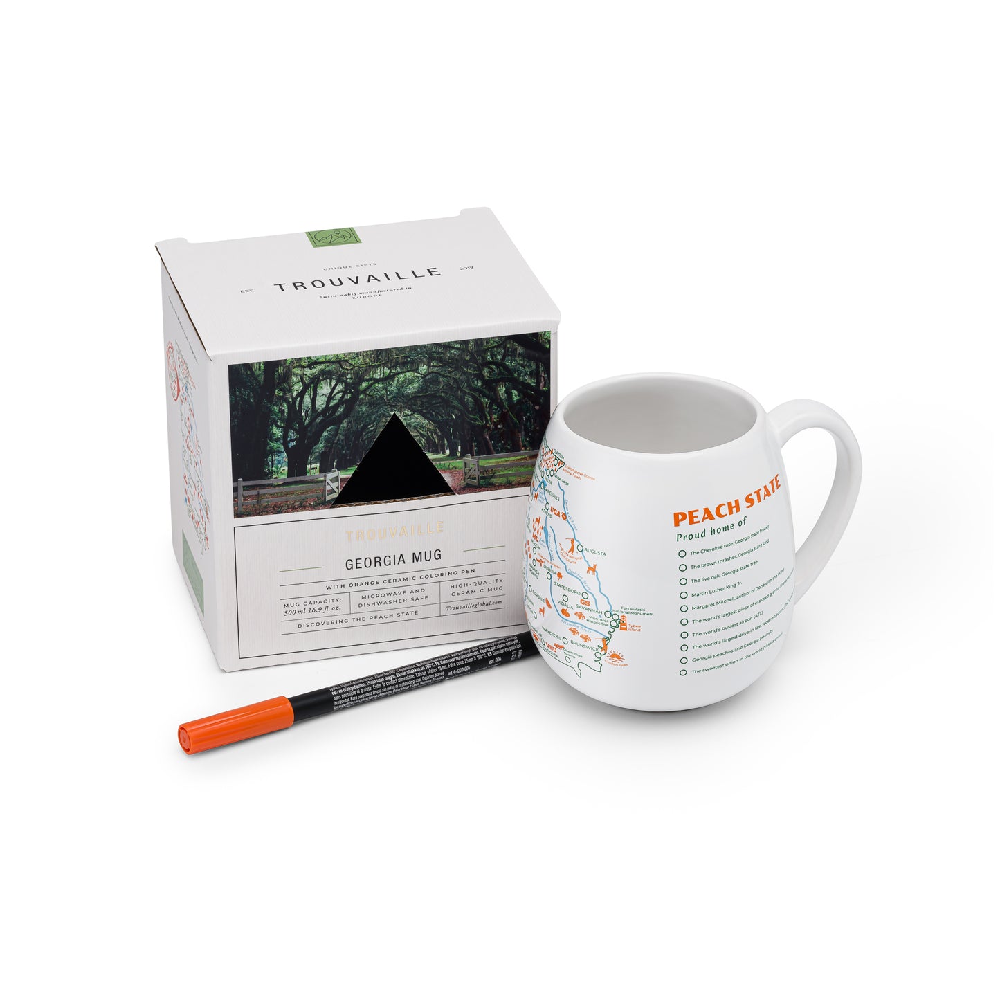 A white travel mug with a map of Georgia printed on it, alongside an orange ceramic pen and its packaging, Atlanta and coastal road trip memory gift