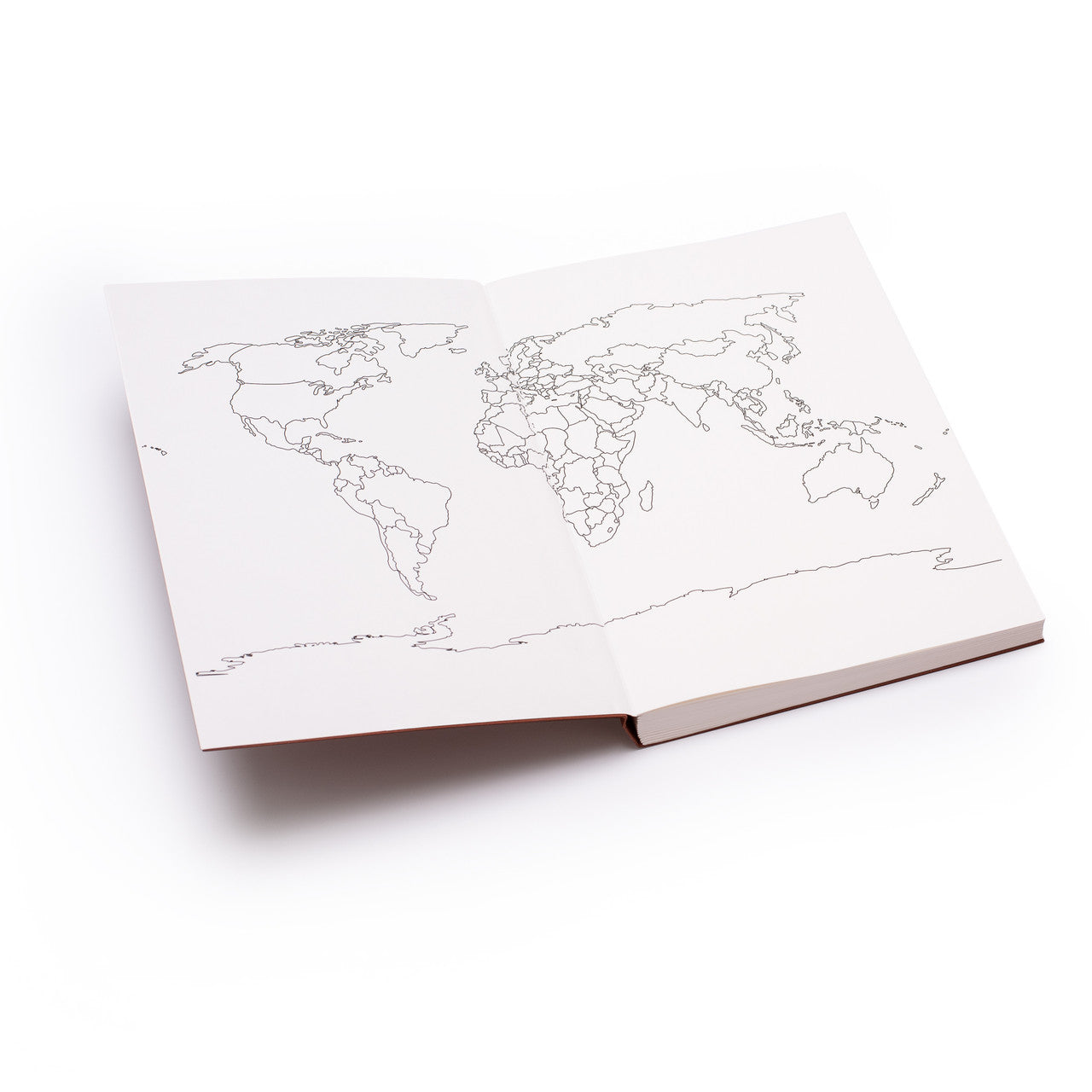 Open pages of recycled world travel journal featuring world map design, sustainable notebook for planning and recording journeys.