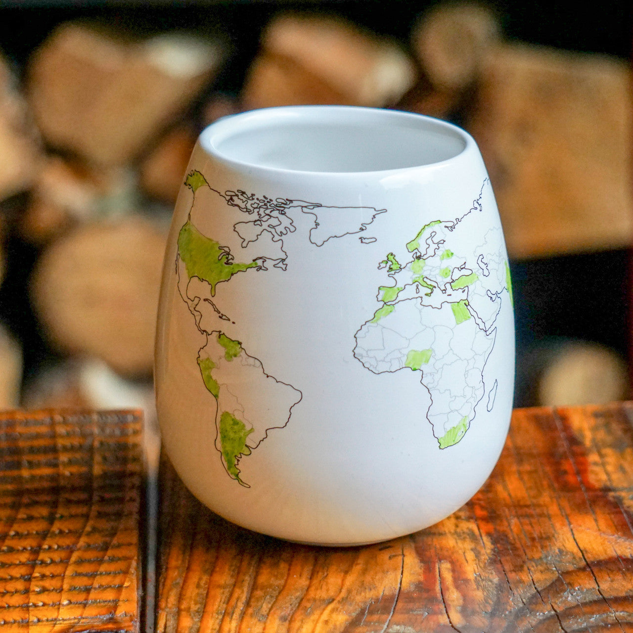 World map travel mug with several countries coloured in green to mark places visited, gift for world traveller